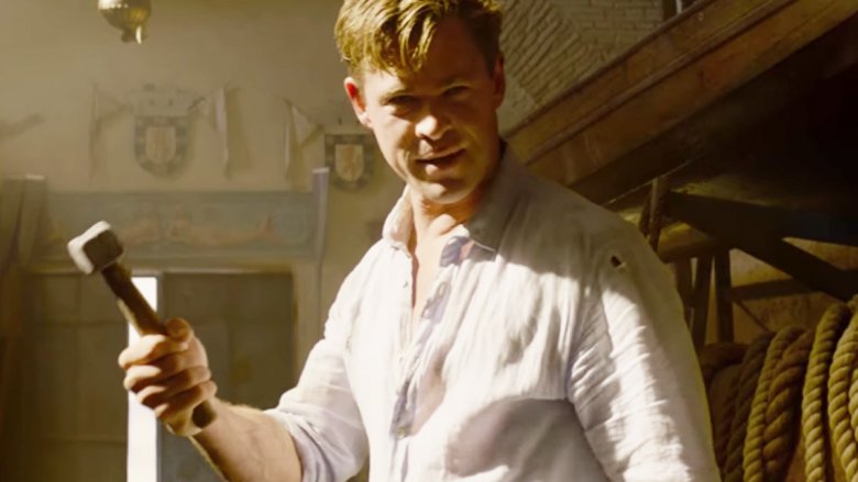 Agent H threatening an enemy with a small hammer